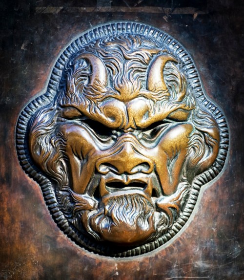 angry bronze devil