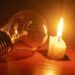 lit candle dead lightbulb