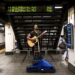 Street musician, playing the guitar on subway station of Manhattan, USA — Photo by Sopotniccy