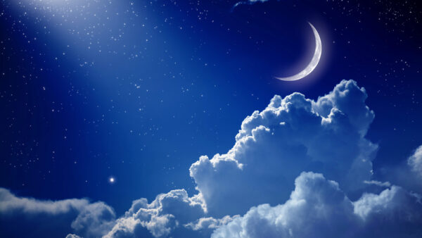 Night sky, with Cheshire cat moon and clouds